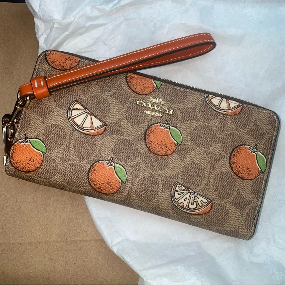 Coach signature with orange print
Accordion wallet New - Picture 9 of 9